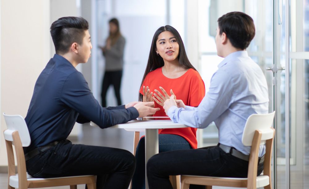 corporate English students in conversation