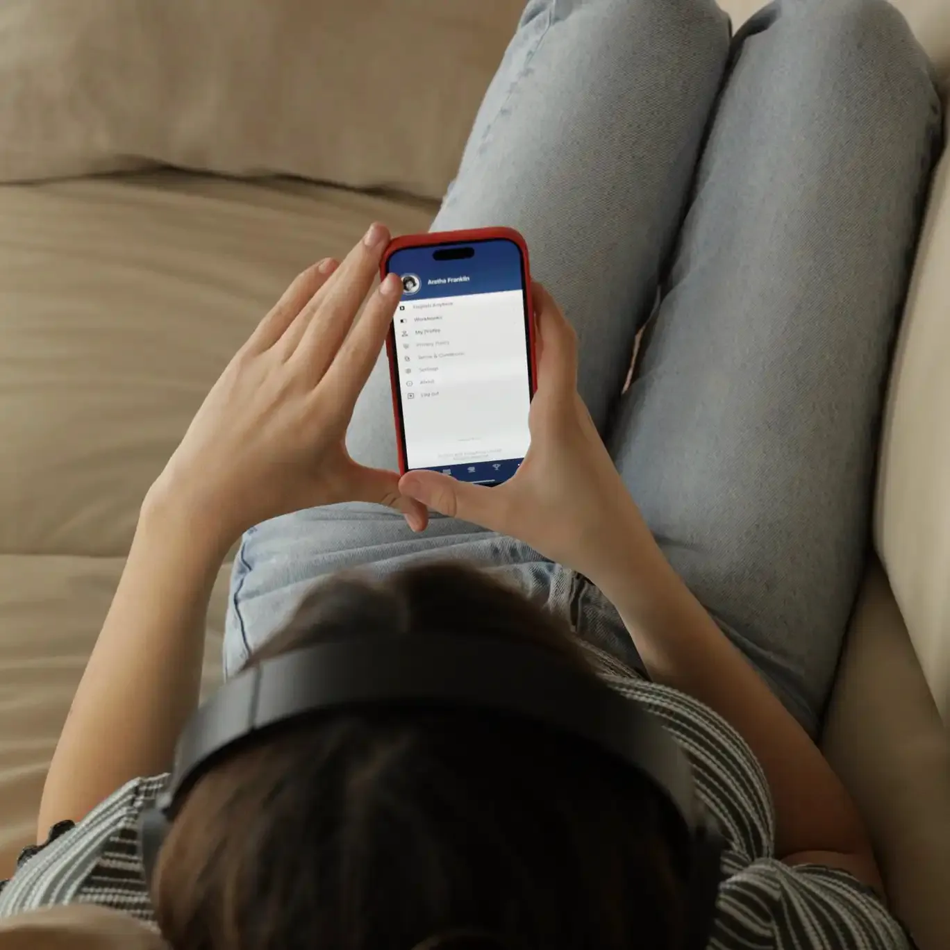 Female student learning on a mobile at Wall Street English